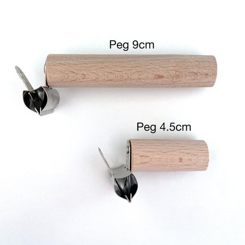 peg for pegboard fitted with metal bulldog clip by kreisdesign