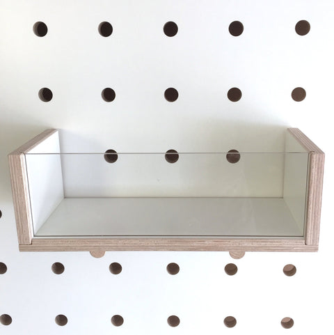 large white wooden box for pegboard with clear front