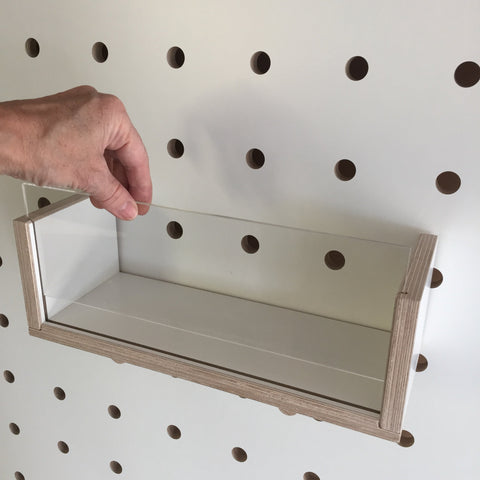 white wooden box with acrylic front that can be removed