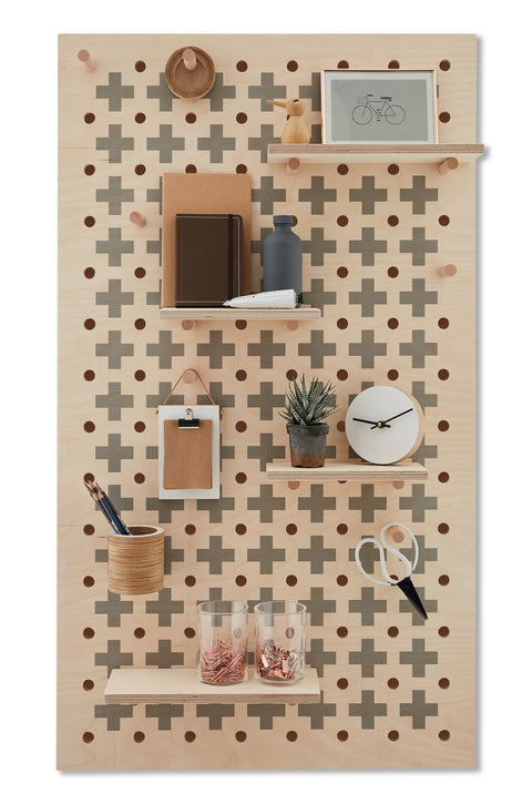 large solid wood pegboard with printed cross pattern. wooden shelves & pegboard hooks to display pictures, storage containers