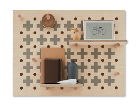 small wooden pegboard with cross pattern print