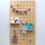 Large wooden pegboard made from highest quality plywood in kids room 