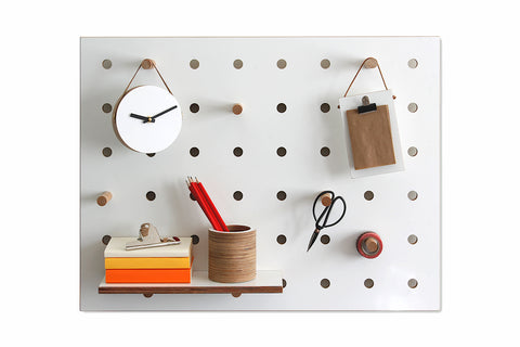 small white wood pegboard for storage on shelves and pegs