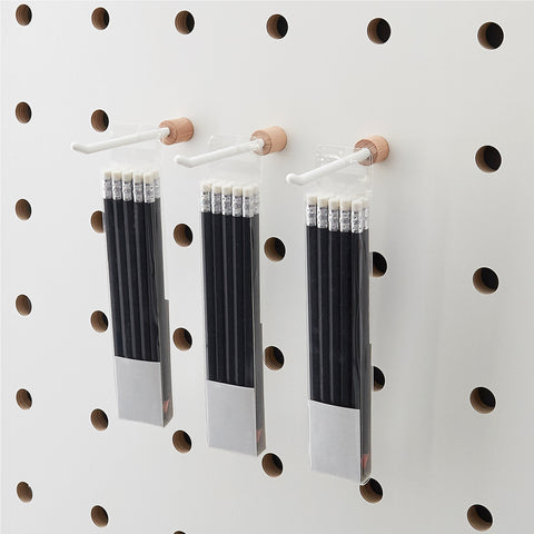 Pegboard peg fitted with black prong for shopfitting - hooks