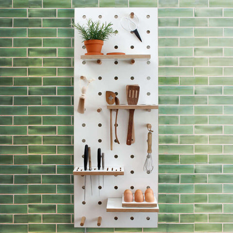 white wooden pegboard for kitchen