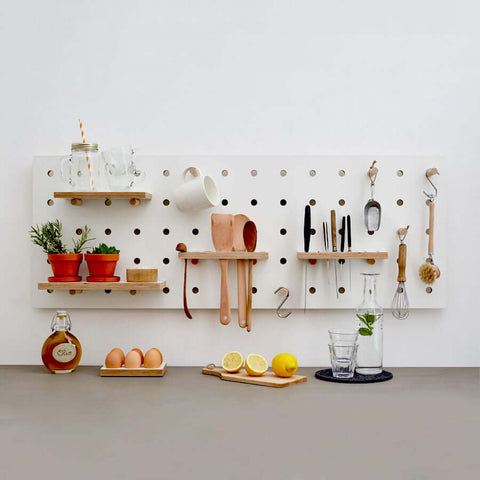 white wood pegboard for kitchen