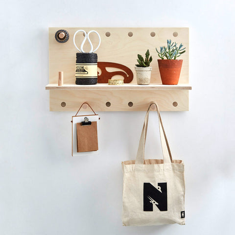 wooden wall shelf in plywood with pegs