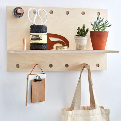 wall pegboard shelf with pegs