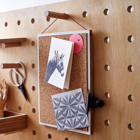 hanging cork pinboard on pegboard