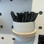 pen display in pot and hoop for kreisdesign pegboard for retail shop