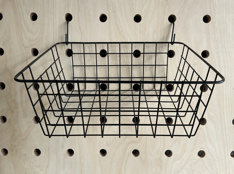 black wire hanging basket for wooden pegboard by kreisdesign 