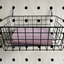 black wire basket with books for pegboard by kreisdesign