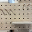 Oak pegboard with shelf and solid wood pegs by kreisdesign