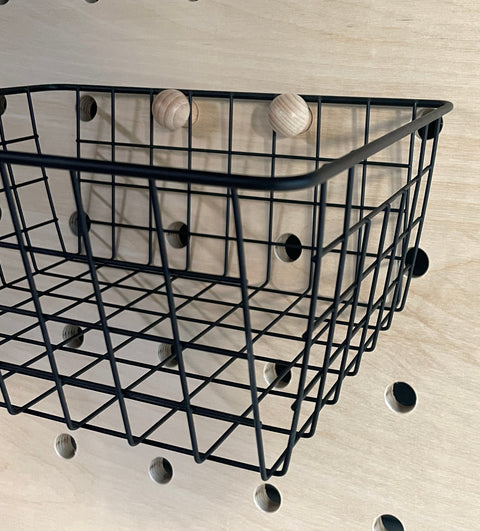wire basket for pegboard for extra storage 