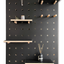 black wooden pegboard birch plywood with shelves and pegs made by Kreisdesign 