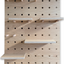 large wooden pegboard finish in oak with wooden shelves and solid pegs