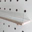 white wooden shelf for pegboard with clear front