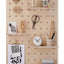 Large wooden pegboard with shelves and pegs made from birch plywood by Kreisdesign
