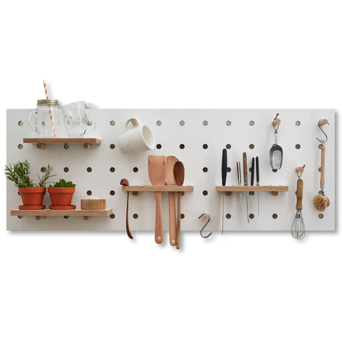 white wooden pegboard for kitchen