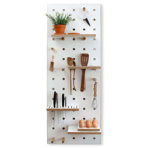 white wooden pegboard for kitchen
