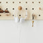 pegs on wooden small pegboard